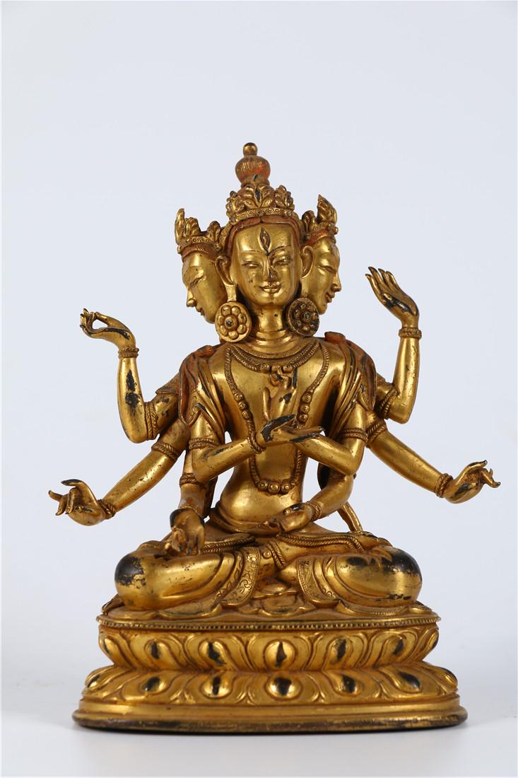 A GILT BRONZE BUDDHA STATUE (1 of 9)