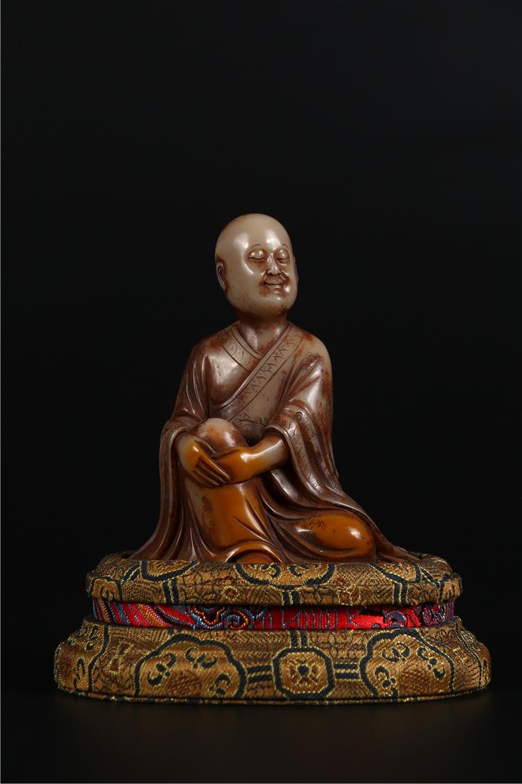 A SHOUSHAN STONE CARVED ARHAT STATUE (1 of 7)