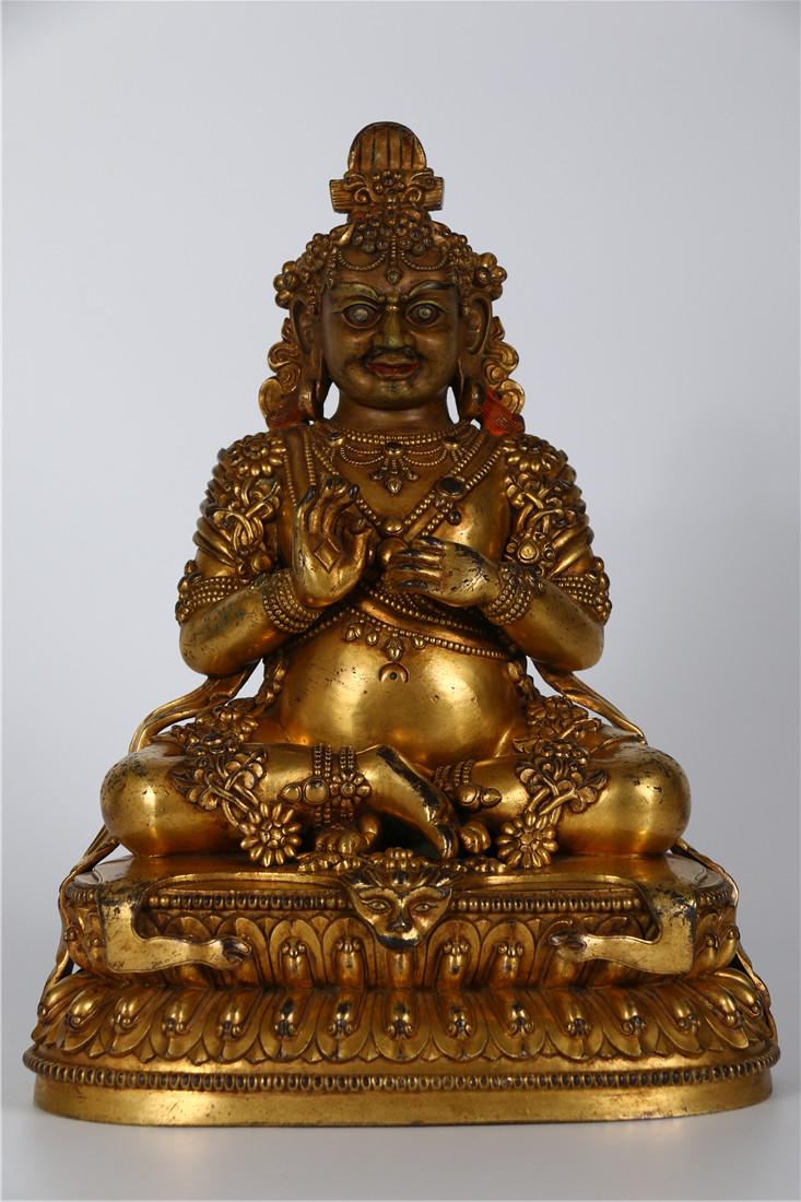 A GILT BRONZE BUDDHA STATUE OF THE GOD OF FORTUNE (1 of 9)