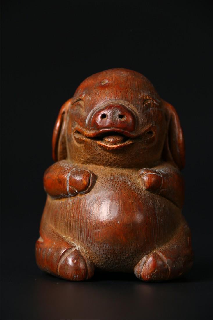 A BAMBOO CARVED PIG SHAPED ORNAMENT, QING DYN. (1 of 7)