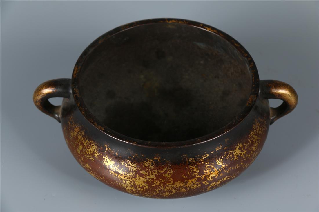 A GOLD INTERSPERSED BRONZE CENSER (1 of 7)
