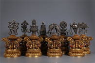 A SET OF EIGHT BRONZE TREASURES