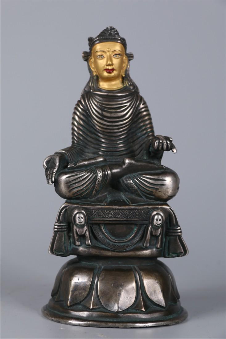 A SILVER SIWATE BUDDHA STATUE (1 of 9)