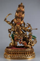 A GILT BRONZE ROHULA BUDDHA STATUE