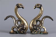 A PAIR OF GILT BRONZE PHOENIX ORNAMENTS