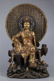 A GILT BRONZE AVALOKITESVARA BUDDHA STATUE