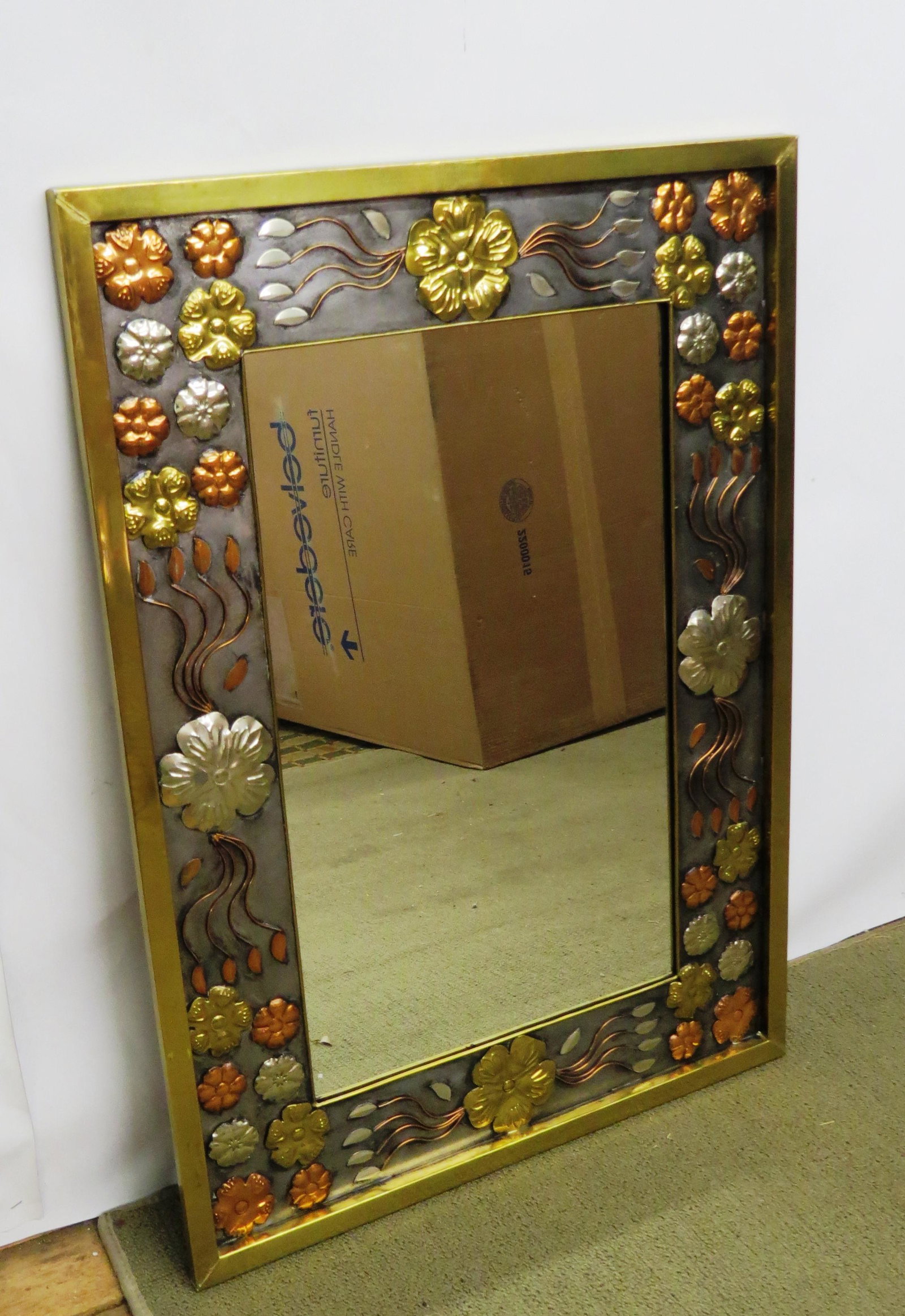 Mirror: Brass and copper metalwork mirror made in Mexico