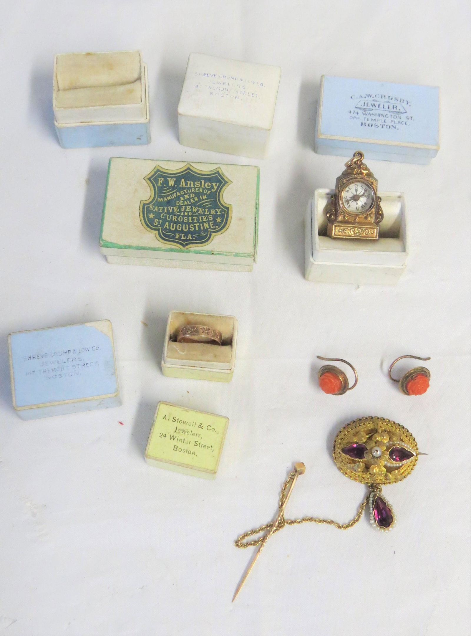 Gold and amythyst pin plus: Lot small jewelry boxes, coral ear rings, Ladies pin with amethyst stones and pearls tests 14K, 4.37 dwt compass charm