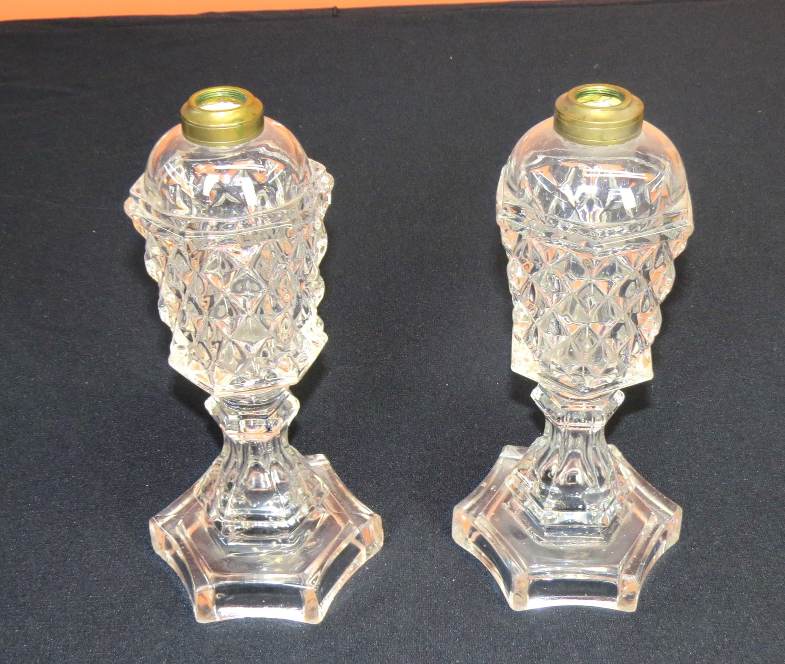 Pair pattern glass whale oil lamps in the Sawtooth pattern: Pair pattern glass whale oil lamps in the Sawtooth pattern, 11” h. very good condition