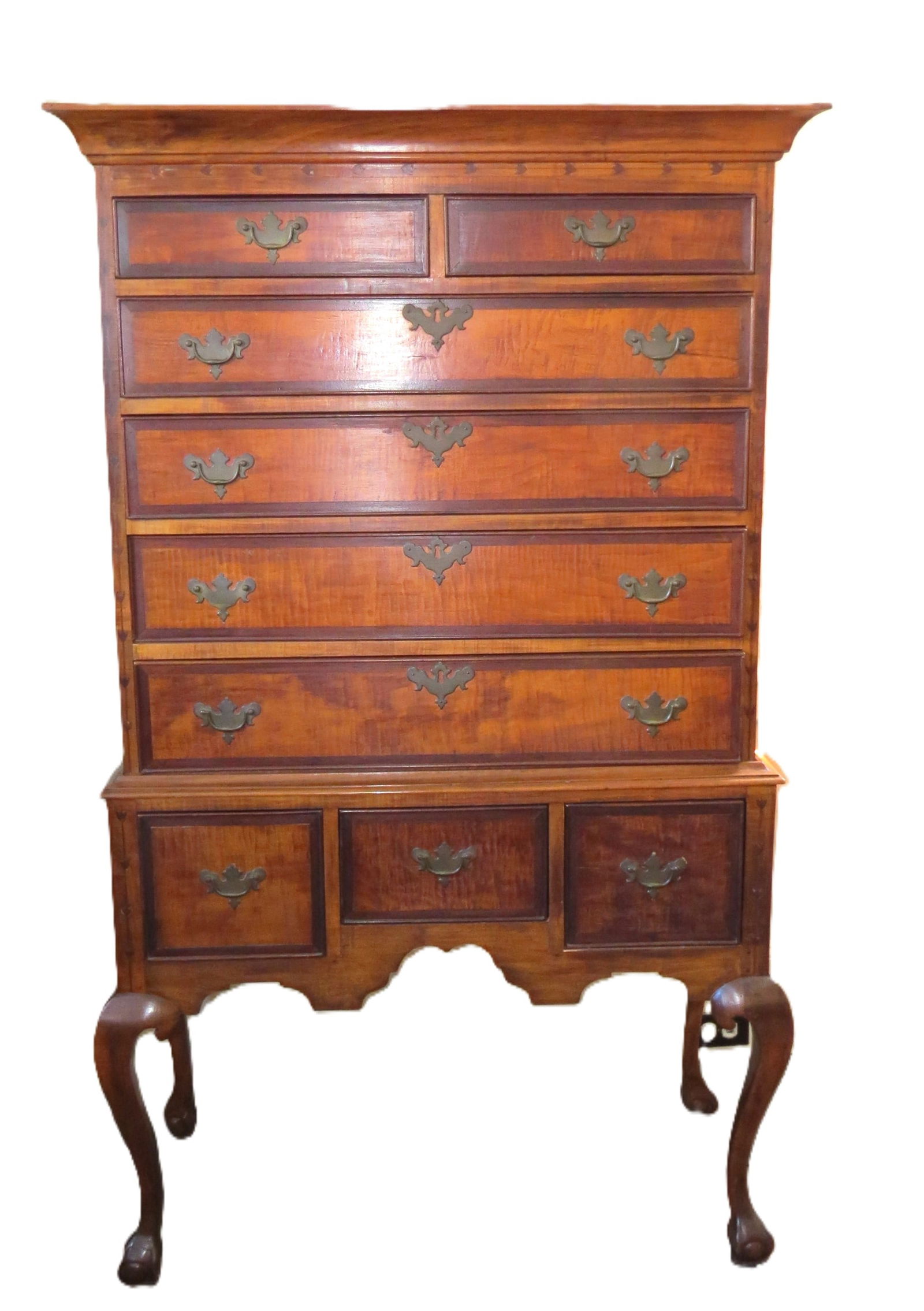 Centennial Queen Ann inlaid highboy with claw and ball feet. (1 of 9)