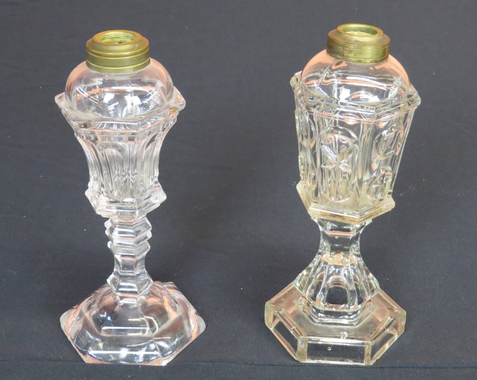 Two Whale oil lamps: Two Whale oil lamps, elongated loop pattern 8 ¾” h. and Star and Punty pattern 9” h., good condition