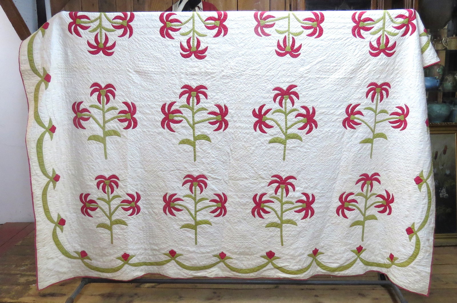 Quilt with green and red floral applique pattern (1 of 6)