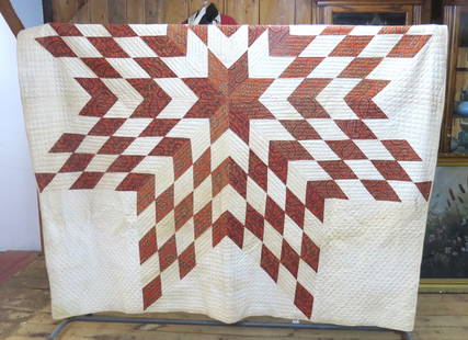 Quilt with large diamond pattern: Quilt with large diamond pattern formed with diamond shaped paisley patches, 77” w. x 86”