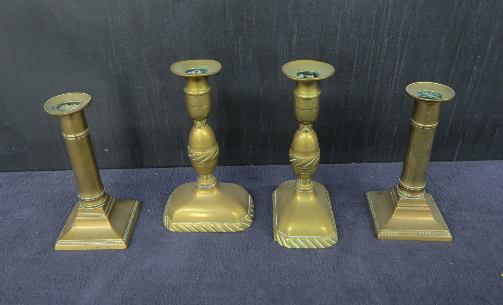 Two pair brass push up candlesticks (1 of 2)