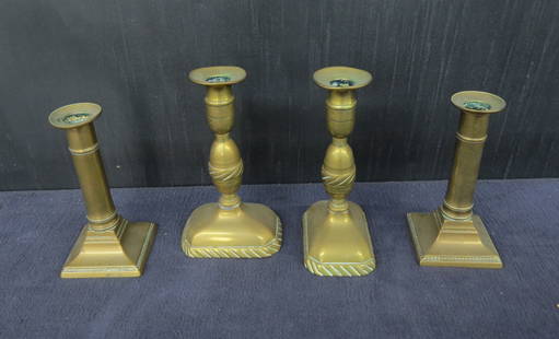 Two pair brass push up candlesticks: Two pair brass push up candlesticks, one pair 6&rdquo; h. and one pair 6 &frac34;&rdquo; h.