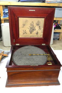 Regina disc music box: Regina disc music box with mahogany case not in working condition, crank does not engage when winding, all the teeth in the comb are in good condition, case 21 ½” w. x 19 ½”