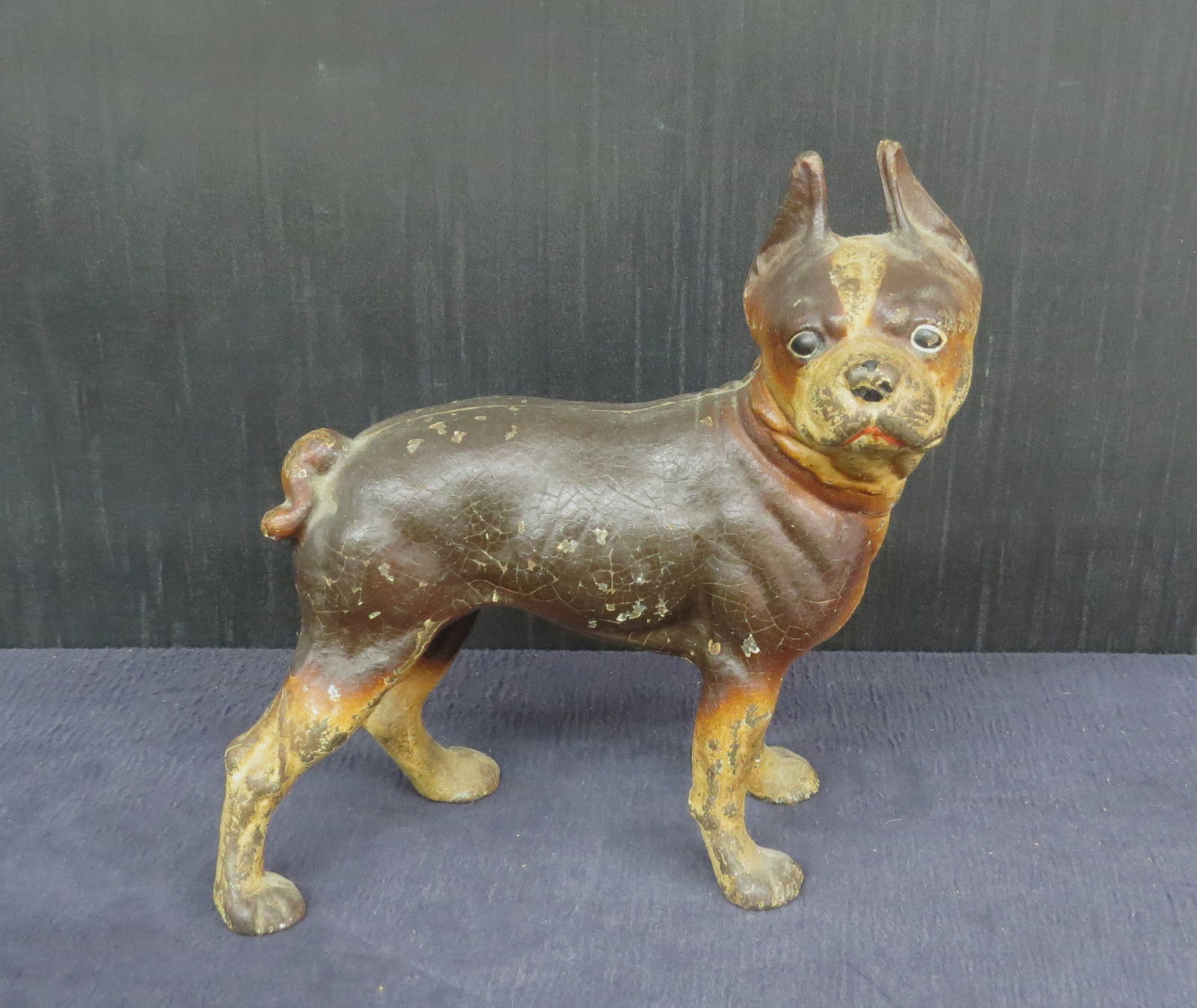 Boston Terrier cast iron door stop: Boston Terrier cast iron door stop in original brown and white paint10” h. x 9 ½” long