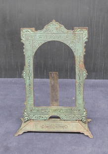 Aesthetic cast iron movement dresser frame: Aesthetic cast iron movement dresser frame, embossed on base Pat. July 20, 75, nice patina, very good condition, holds photo 6 ¾” x 4 ¼”, base 7” x 3”, stands 9 &