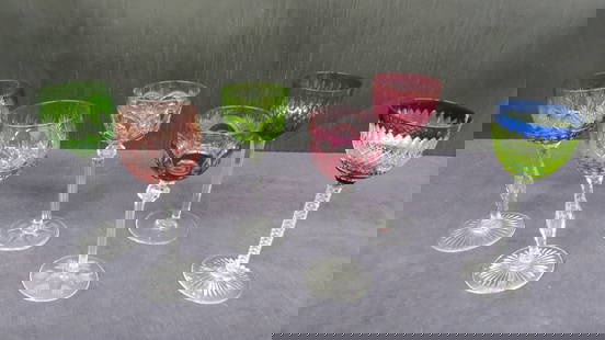 Lot six American Brilliant cut glass overlay stems: Lot six American Brilliant cut glass overlay stems containing pair hollow stem strawberry diamond and fan with rayed base one in cranberry and one in green, pair knob stem fan and thumbprint, one cran
