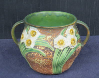 Roseville Pottery vase: Roseville Pottery vase in the Jonquil pattern with black paper label, 5&rdquo; h. x 7 &frac12;&rdquo; wide handle to handle, excellent condition