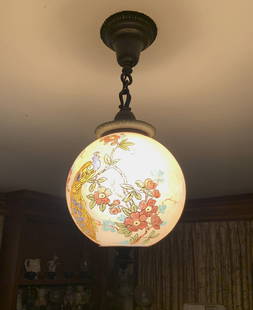 One of two Handel hanging hall lamps: One of two Handel hanging hall lamp with reverse painted ball shade in Peacock pattern, signed Handel 7259, top opening 3 &frac12;&rdquo; base opening 3 &frac34;&rdquo; overall from ceiling plate to t