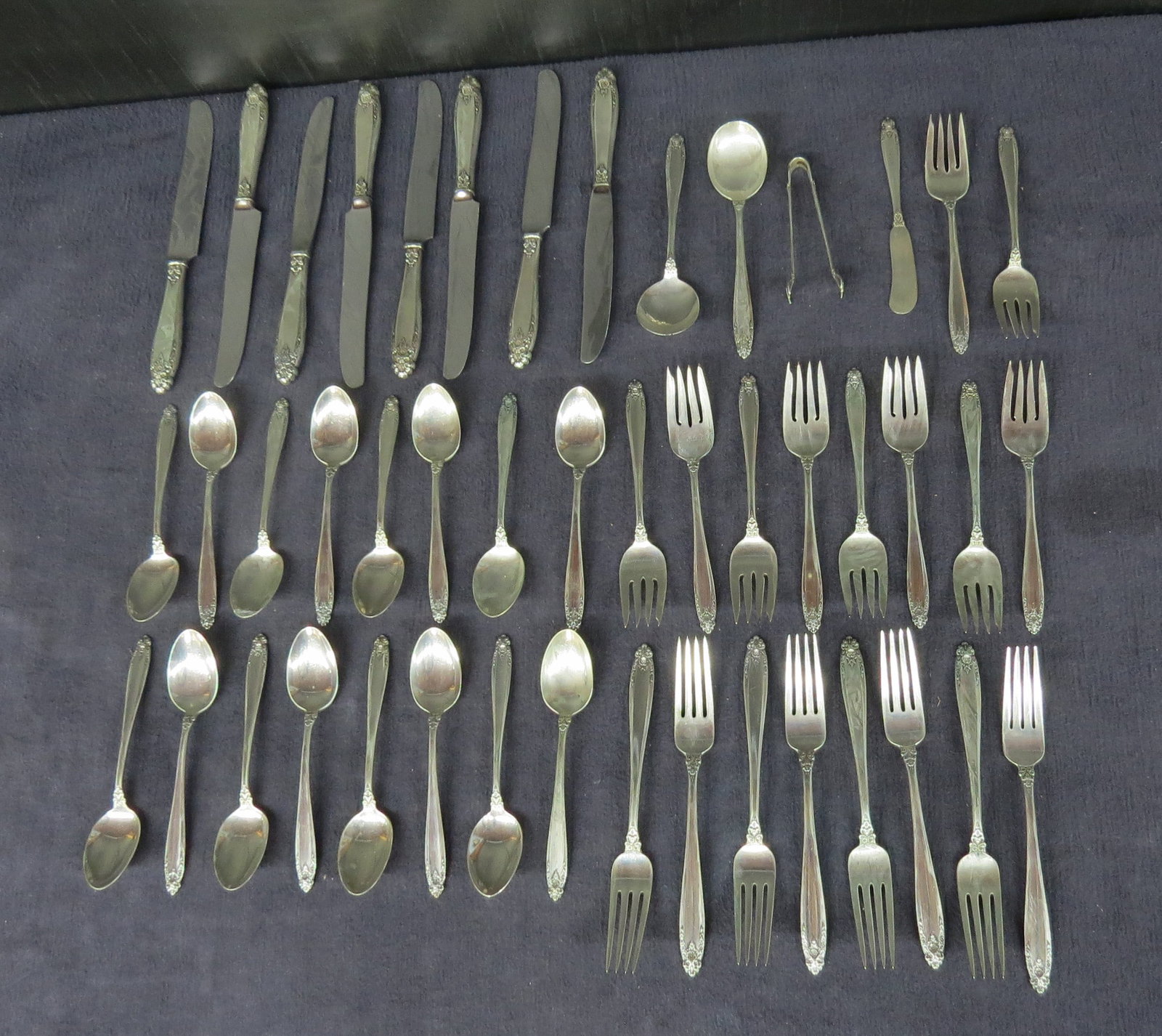 Partial sterling silver flatware set (1 of 7)