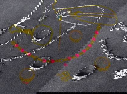 Lot 10K gold jewelry some as is: Lot 10K gold jewelry some as is. Magnifying glass missing lens, stick pin, hair pin, two ring settings, bracelet one stone loose, garnet stone ring and charm, 21.5 dwt