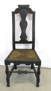 Rare William and Mary Spanish Foot side chair: Rare William and Mary Spanish Foot side chair in black paint, 46&rdquo; h. x 18&rdquo; seat height, carved and scrolled crest, vase splat, rush slip seat, double drop skirt over bulbous front turning,