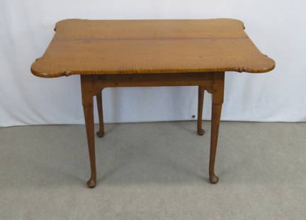Curly maple porringer top tea table: Curly maple porringer top tea table, 39” w. at longest point, 29” deep at deepest point, 26” h. , Queen Ann cabriole leg on duck foot with pad, two board curly maple top. All origina