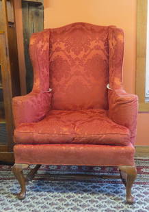 Reproduction Queen Ann wing chair: Reproduction Queen Ann wing chair with good red upholstery, stands 47&rdquo; h. x 32&rdquo; w., with 20&rdquo; seat height