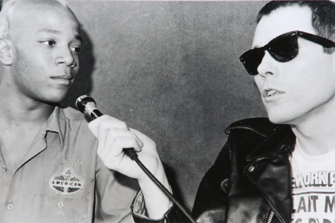 Bobby Grossman (20th Century): Jean-Michel Basquiat, 1979, Nineteen Year Old Basquiat and Glenn O'Brien, Silver Gelatin Print, 8" x 12", Edition: A/P, Signed on Verso, Unframed.