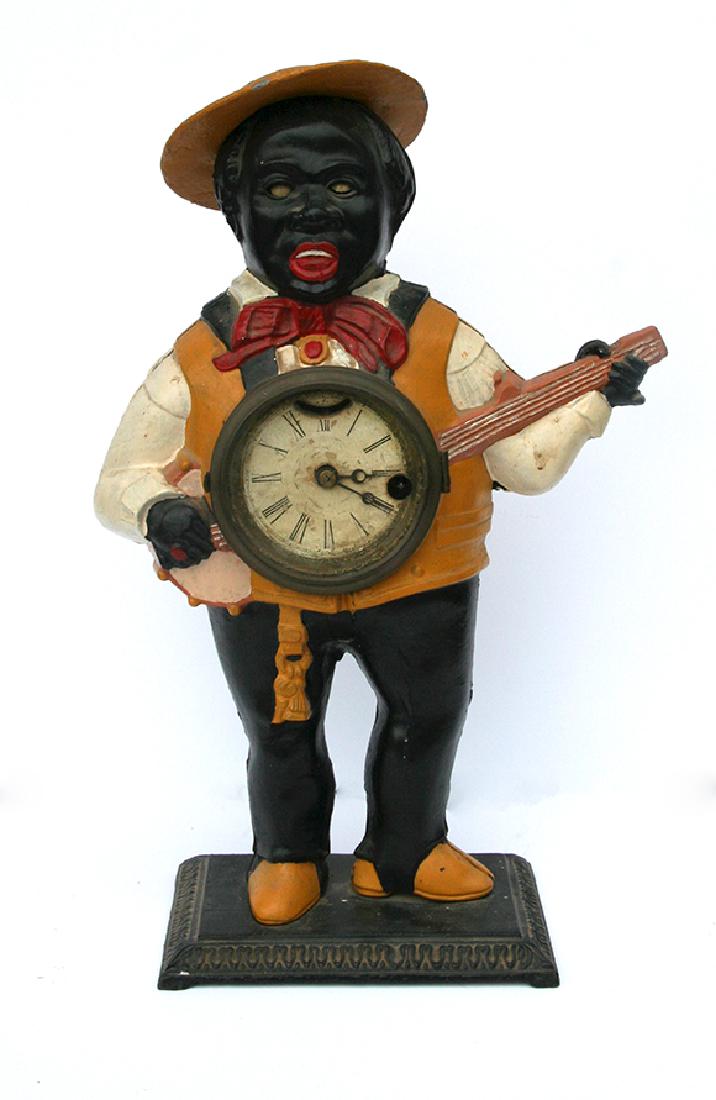 Unknown: Banjo Player, c. 1940, Iron Clock, 16"H x 7"W x 4.75"D, Unsigned. Collection of Eric Weissberg.