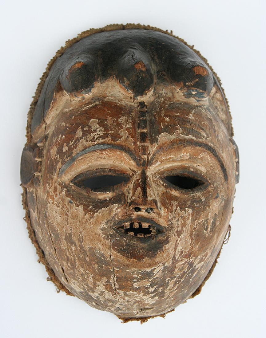Unknown African: Ceremonial Mask, c. 1900, Polychrome Carved Wood with Fiber Surround, 8" x 6"
