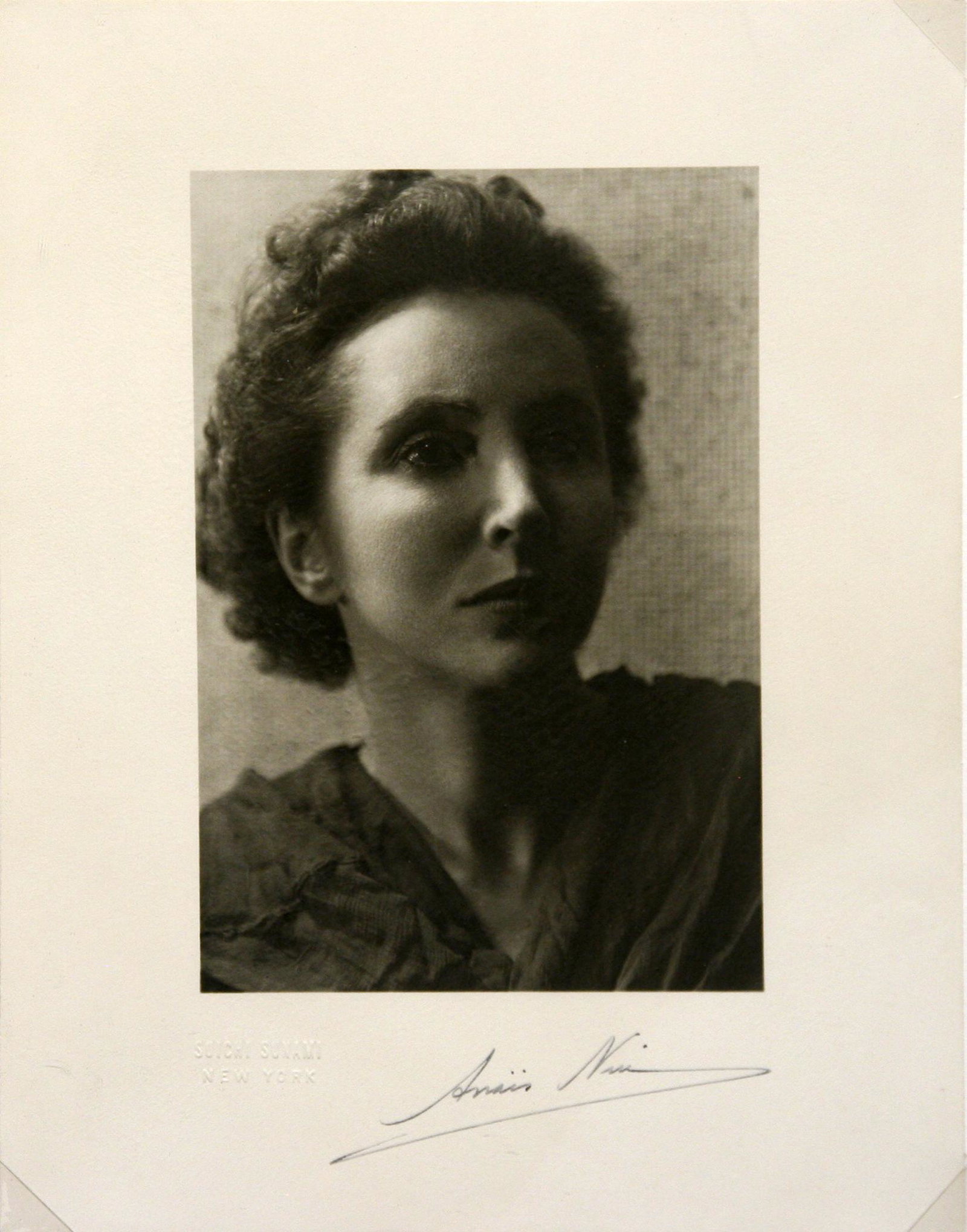 Soichi Sunami (1885 - 1971): "Anais Nin"; c. 1942; Gelatin Silver Print; 6.25" x 4.25"; Blind Embossed Lower Left; Framed (under glass); Note: autographed by Anais Nin; Provenance: From the Estate of Marcuse â€œCusie” P