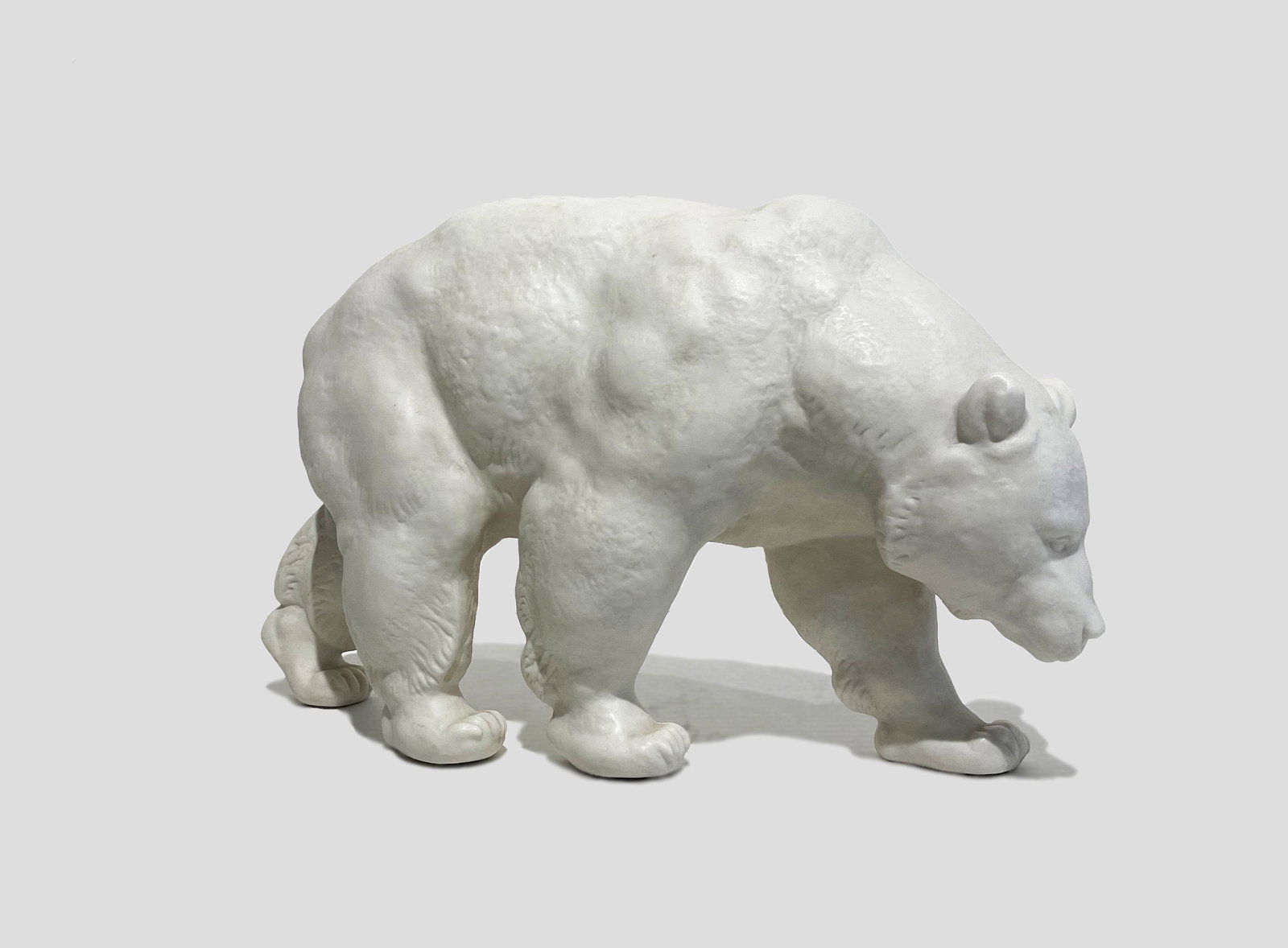 Hutschenreuther Kunstabteilung Porcelain: "Polar Bear"; c. 1940s; Porcelain; 7.25" x 12.5" x 3.5"; Hallmark Stamped on Front Right Foot.