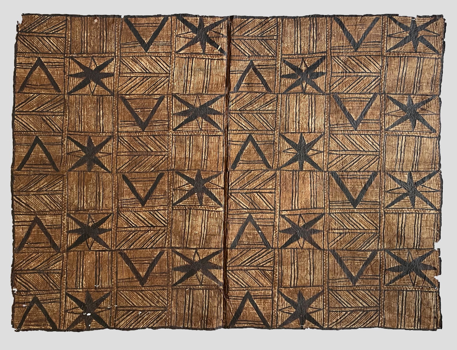 American Samoan Tapa: American Samoan Tapa; Possibly 19th Century; Ink on Barkwood; 53" x 71"; Unframed.