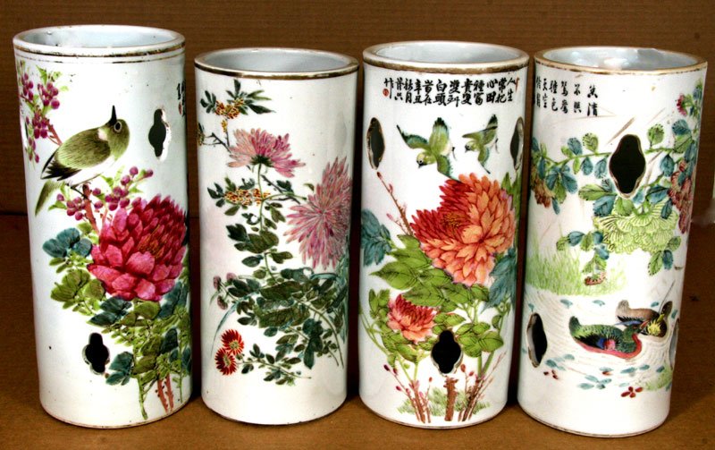 Chinese (Qing Dynasty) Pierced Vessels: Lot of 4 Pierced Cylindrical Vessels used to store scrolls (one un-pierced), 1900-1920, Porcelain, 11" High, Signed on Bottom with porcelain studios noted. Painted decoration (bird and flower motif) o