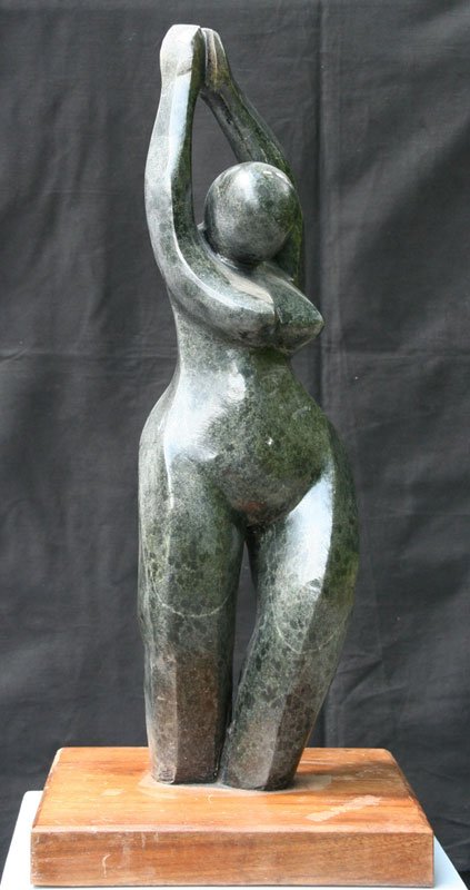 Anthony G. Gennarelli (1915-2001): Female Nude in Yoga Position, c. 1995, Black Marble, 25.5" H. Walnut base.