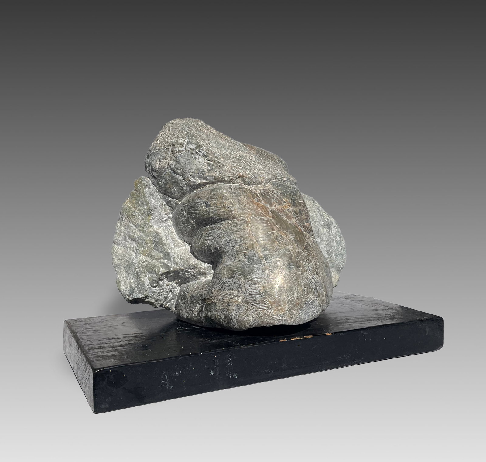 Attributed to Hannah Small (American, 1903 - 1992): "Nude Woman in Stone"; n.d.; Carved Marble; 11" H x 13.5" W x 9" D; Unsigned; Weight: 55 lbs.