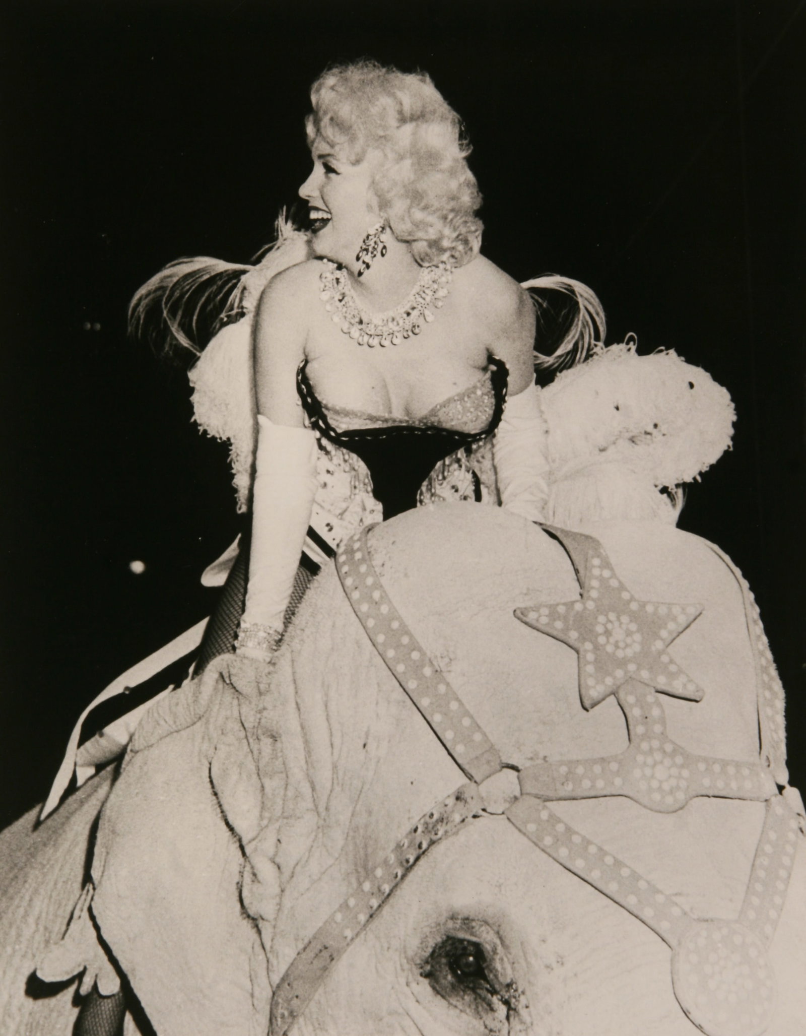 After Marvin Scott (American, b. 1945): "Marilyn Monroe Riding an Elephant"; 1955; Digital Photograph; 9.5" x 7.5"; Unsigned; Unframed; Note: Printed later.