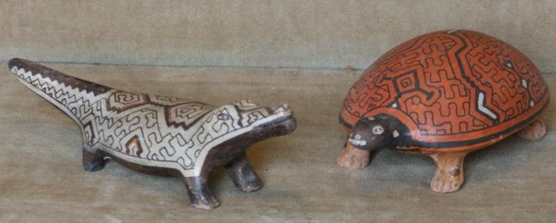 Unknown Peruvian Artisans: Pair of Shipibo Animal Sculptures: A. Crocodile, Polychromed Clay (fired), 9" x 3" x 3"; B. Turtle, Plychromed Clay (fired), 7.5" x 4.5" x 3.5".