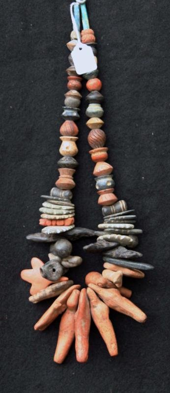 Unknown Peruvian: Necklace, n.d., Fired Clay Spindle Whirls & Terra Cotta Whistles (animal forms) 24", N/A.