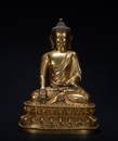 A gilt-bronze figure of shakyamuni