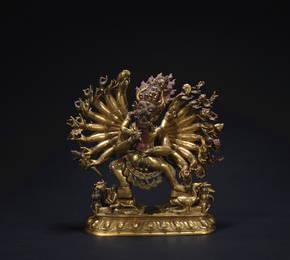 A gilt-bronze statue of Yamantaka