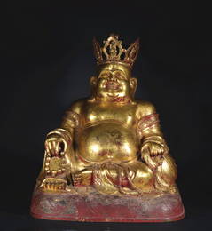 A gilt-bronze statue of Maitreya