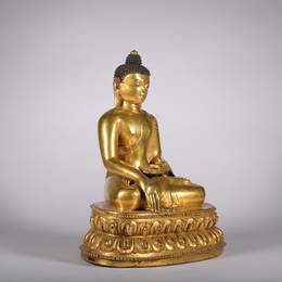 A gilt-bronze statue of Sakyamumi