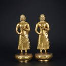 A pair of gilt-bronze statue of buddha