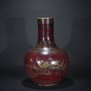 A red glazed globular shape vase