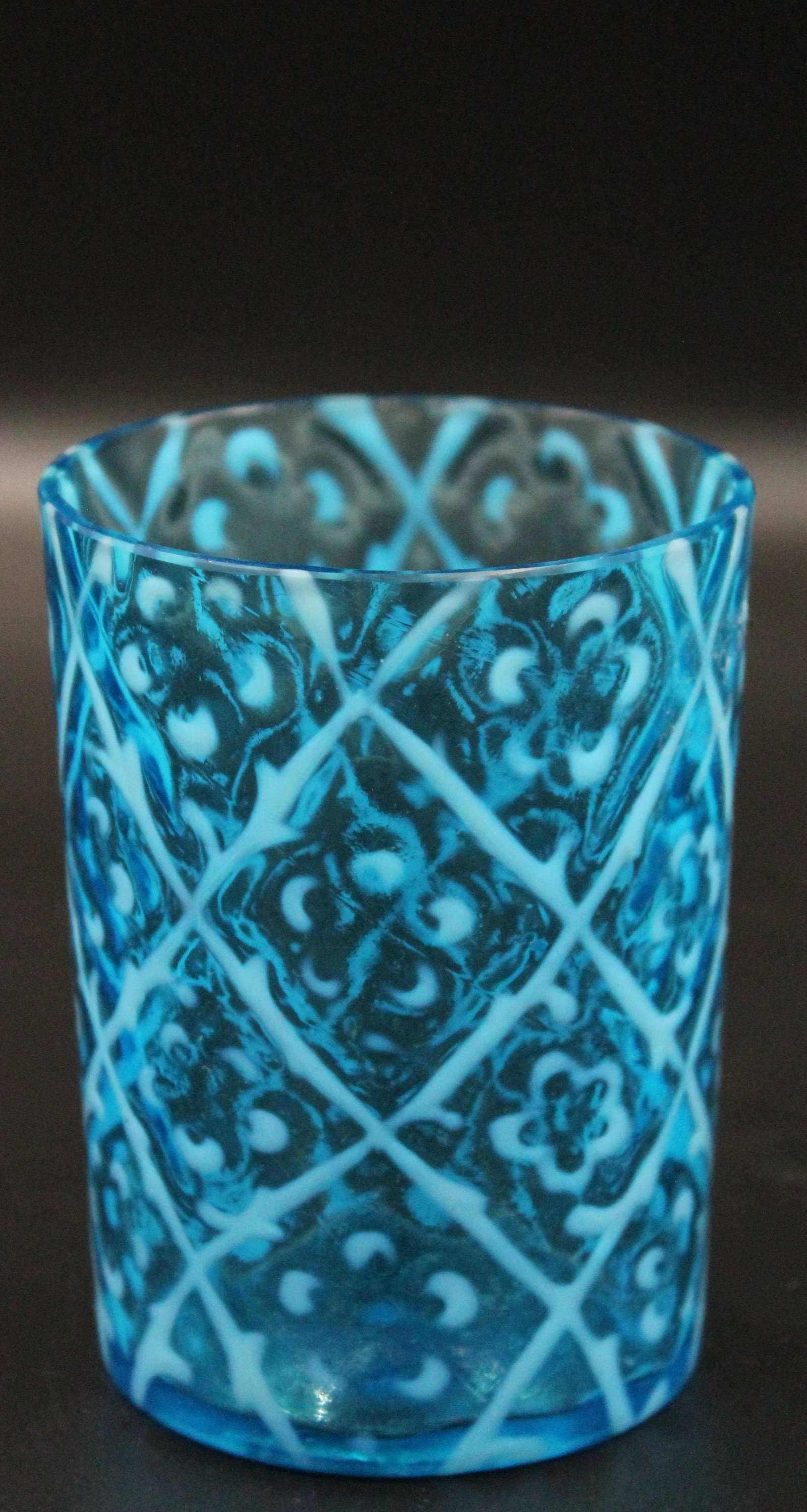Beaumont Opalescent Daisy in Criss Cross Tumbler: Blue opalescent Victorian daisy in Criss Cross Tumbler.Measures 3 3/4" H, 2 3/4"W.