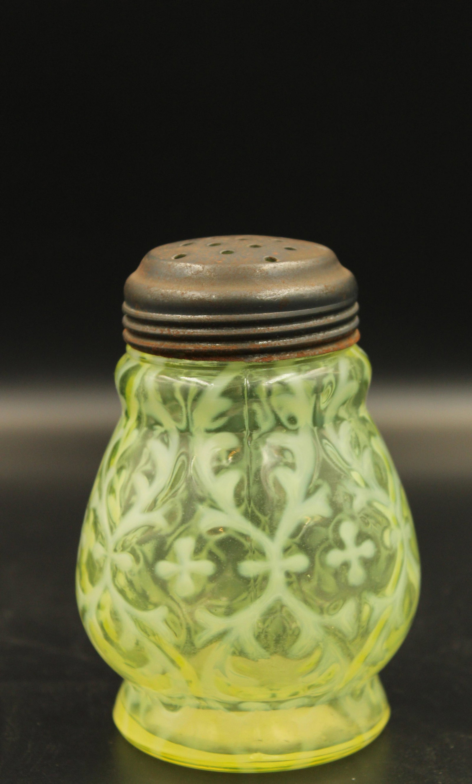 Northwood Opaline Brocade Spanish Lace Sugar Shaker: Super Northwood Vaseline opalescent Spanish Lace pattern sugar shaker. Measures 4 1/4" H, 3 1/4" W.